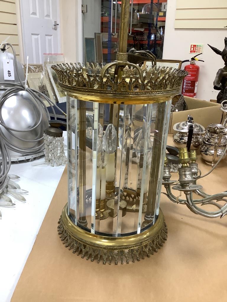 A 1920's brass and bevelled glass hall light